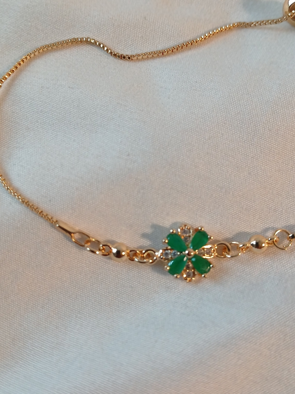 Pandora Gold-Tone Bracelet with Green Flower Charm